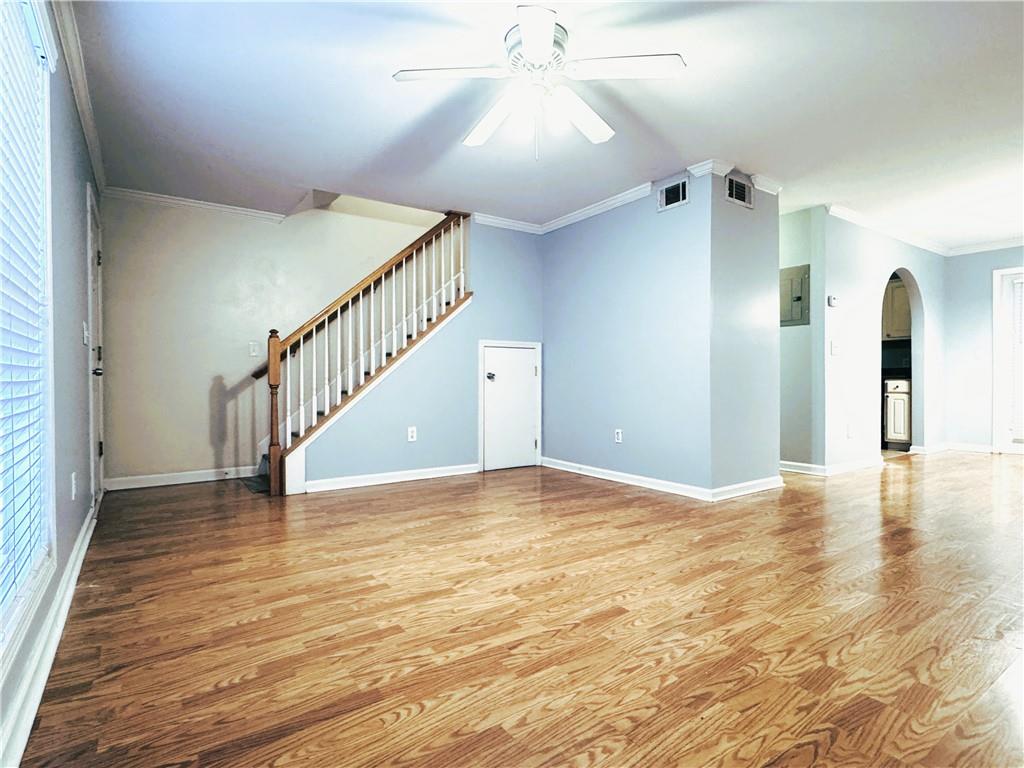 112 Summer Place Northwest Norcross, GA 30071 - Photo 2 of 24 a view of empty room with wooden floor