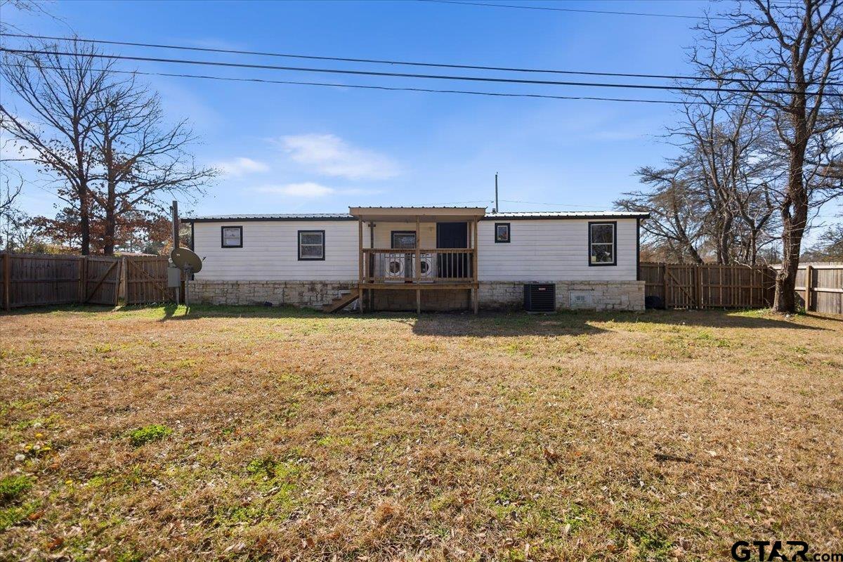5950-c R 486 C R 486 Tyler, TX 75706 - Photo 18 of 19 a view of a house with a yard