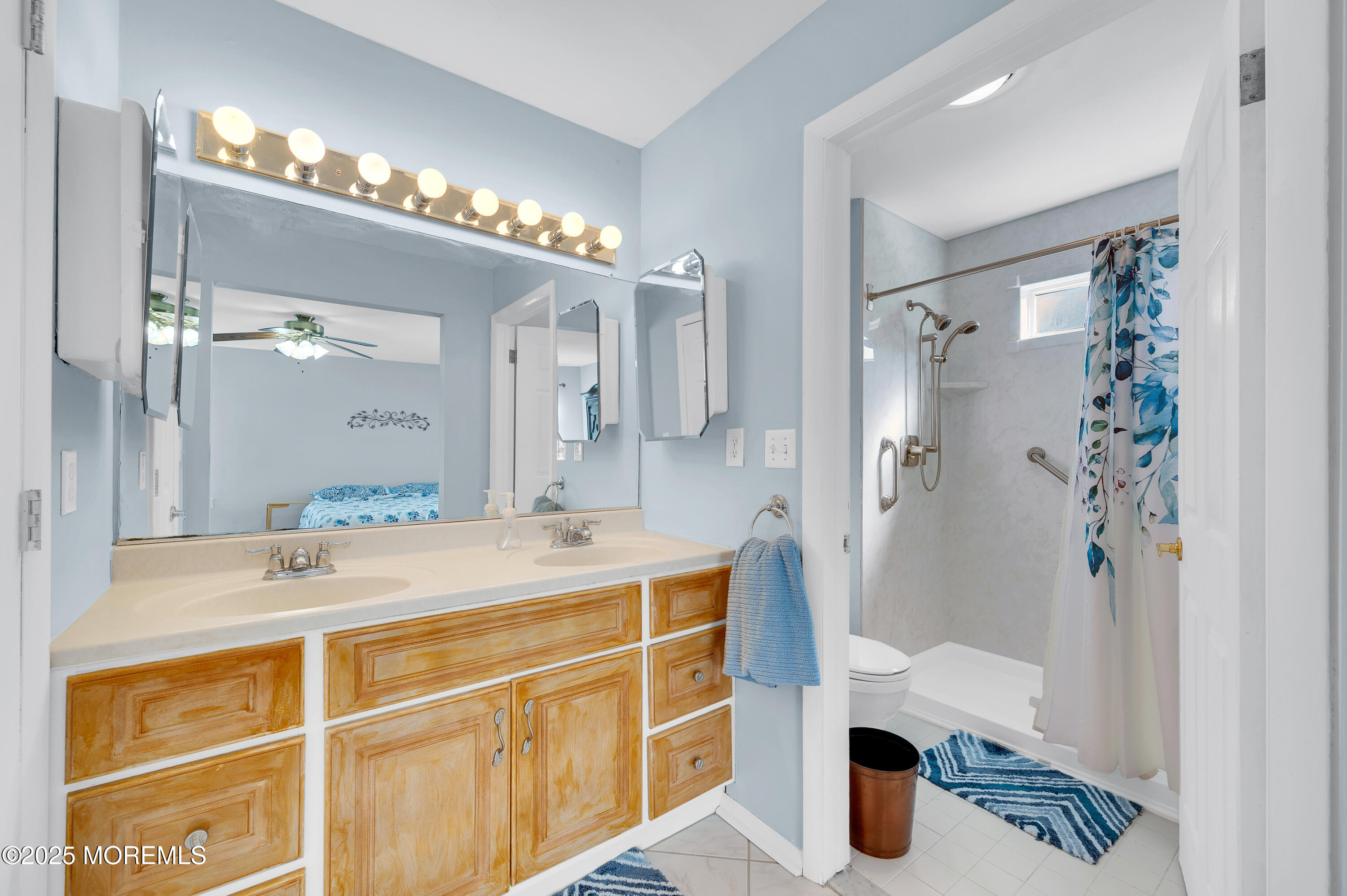 41 Red Hill Road Manchester Township, NJ 08759 - Photo 18 of 39 a bathroom with a sink a toilet and shower