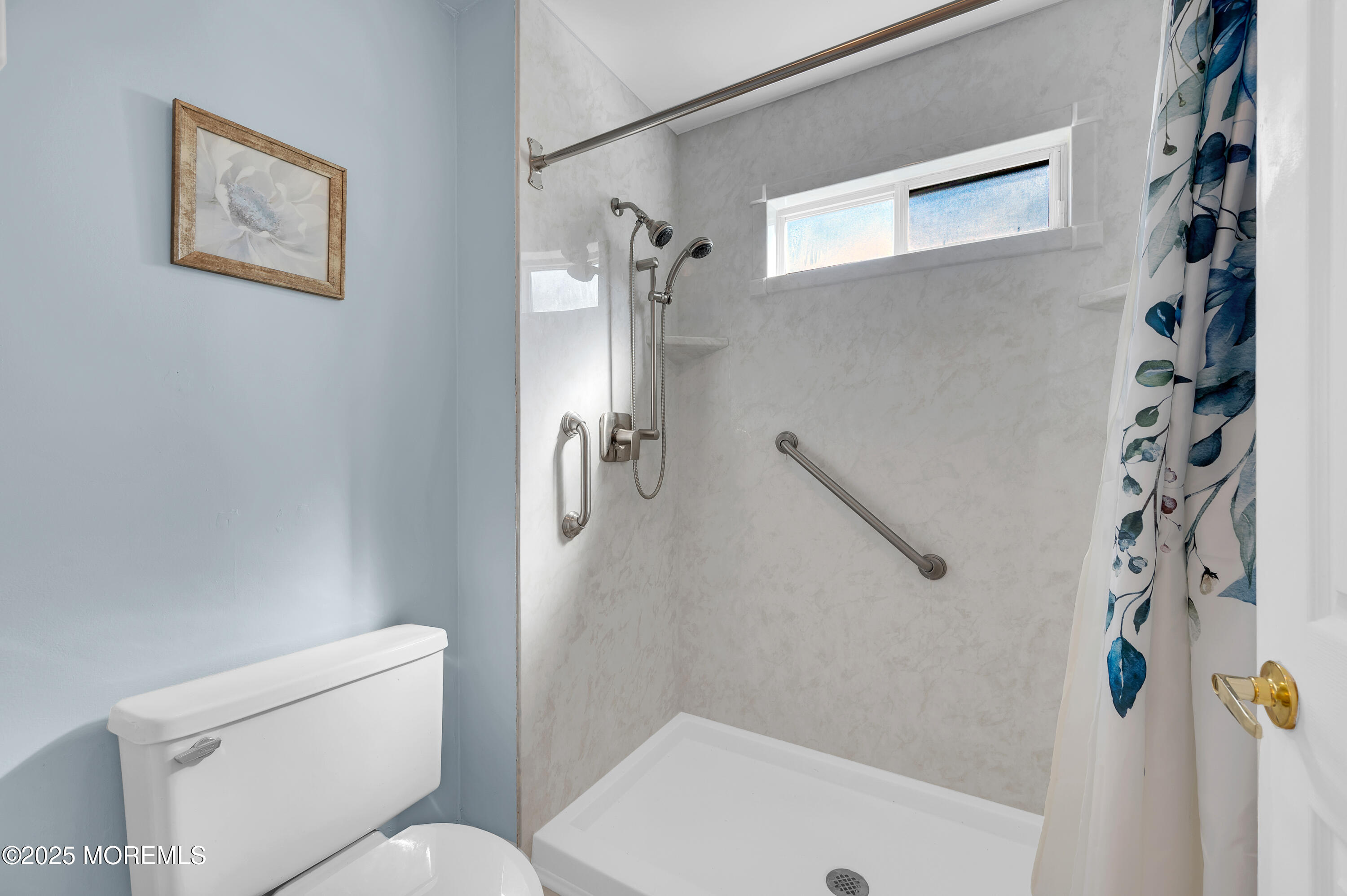 41 Red Hill Road Manchester Township, NJ 08759 - Photo 19 of 39 a bathroom with a toilet and a shower