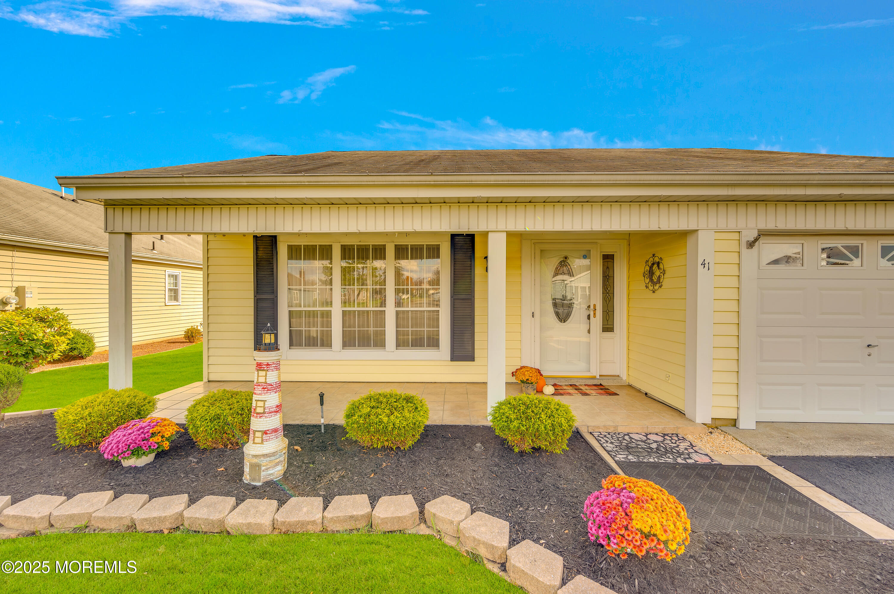 41 Red Hill Road Manchester Township, NJ 08759 - Photo 2 of 39 a front view of a house with outdoor seating