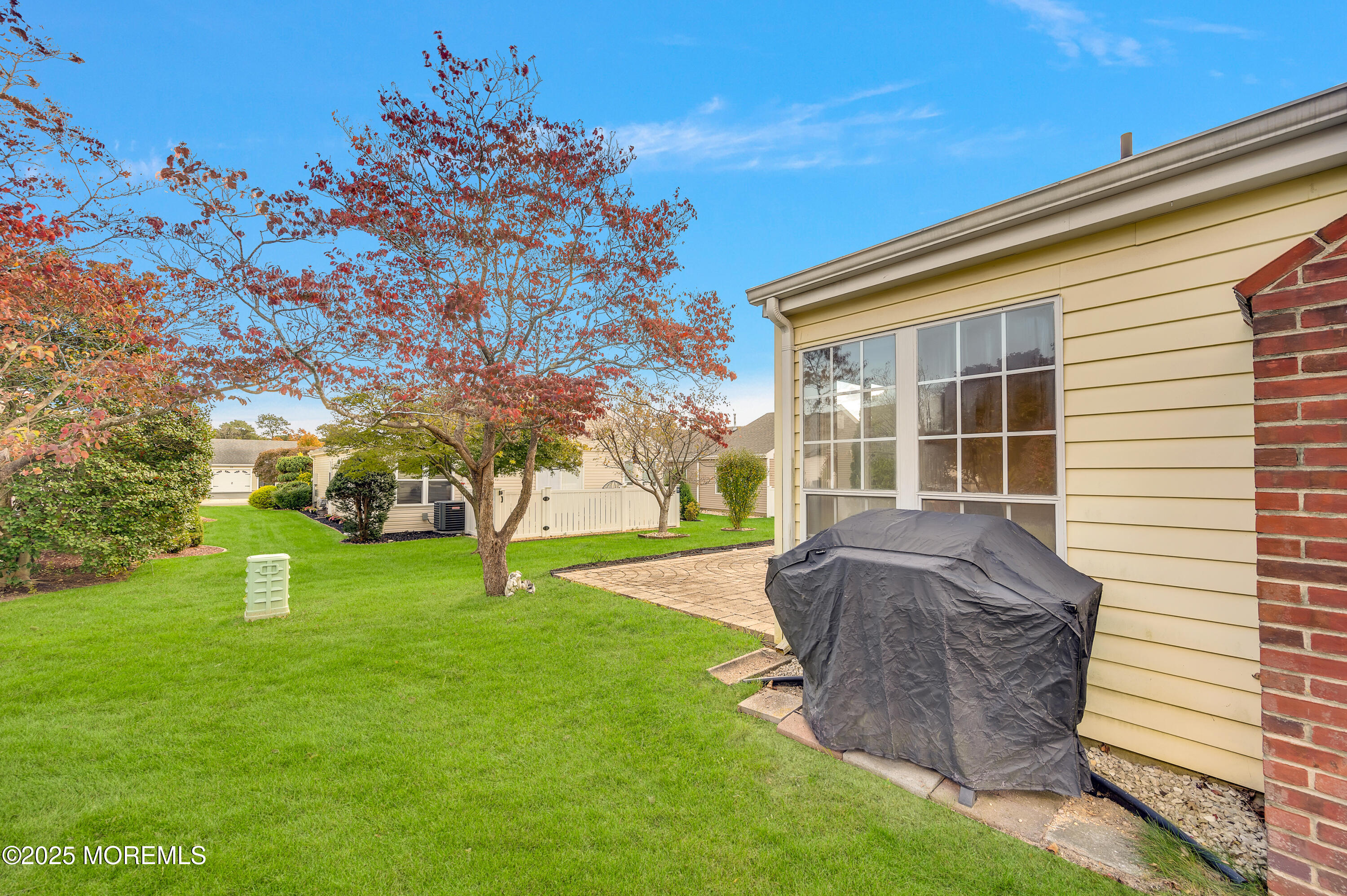 41 Red Hill Road Manchester Township, NJ 08759 - Photo 30 of 39 a front view of a house with garden