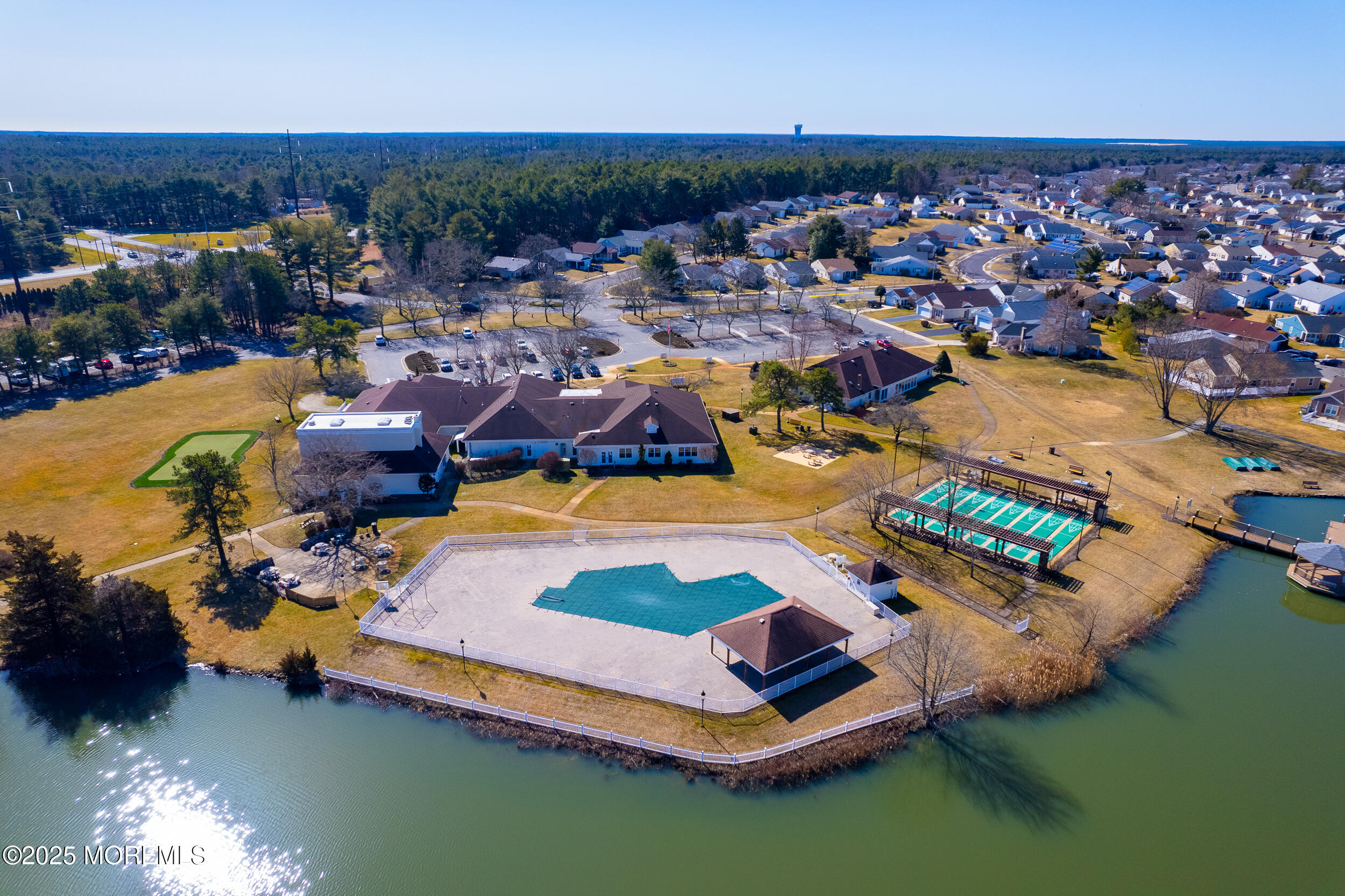 41 Red Hill Road Manchester Township, NJ 08759 - Photo 33 of 39 an aerial view of a house with a garden and lake view