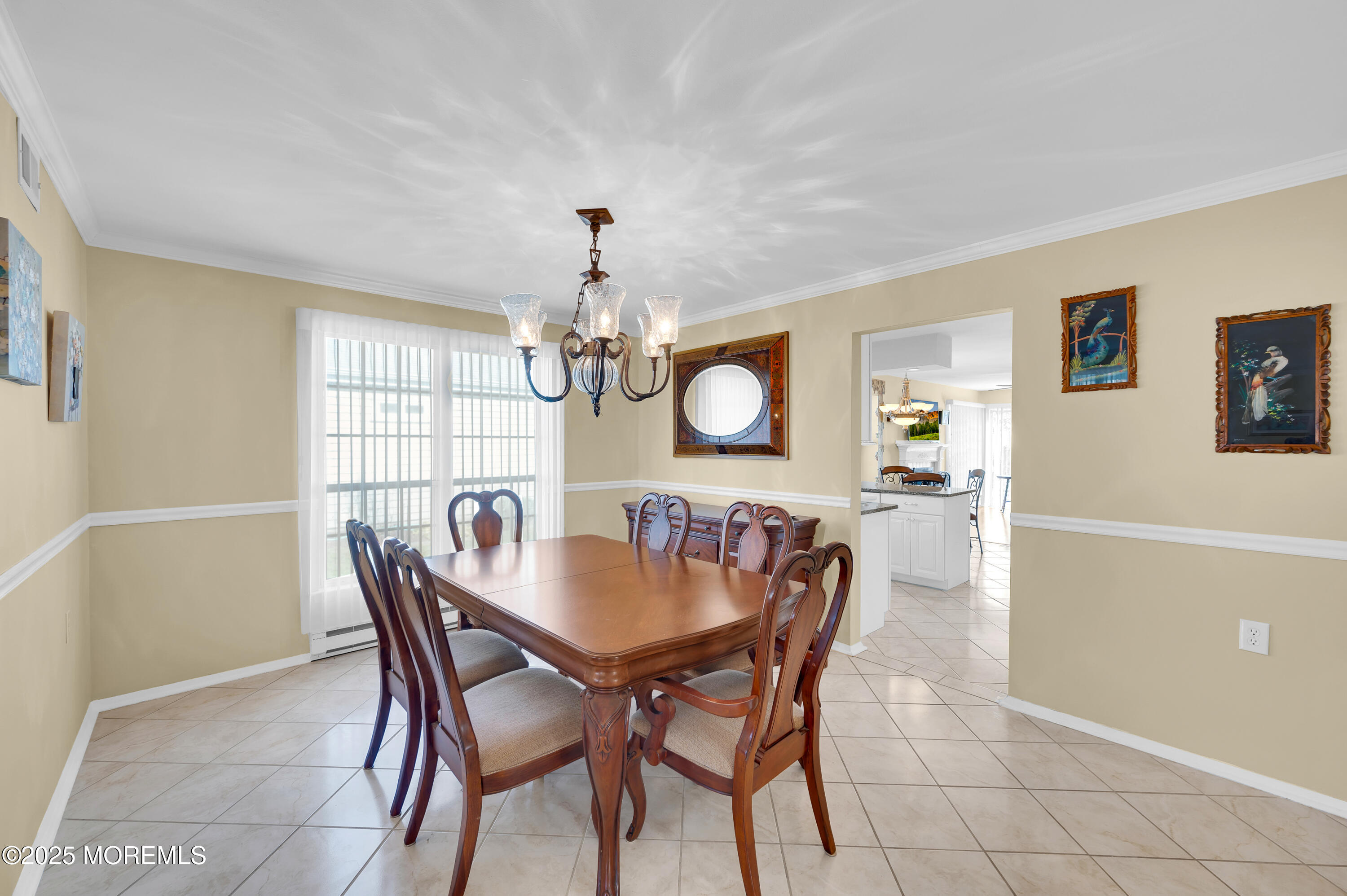 41 Red Hill Road Manchester Township, NJ 08759 - Photo 9 of 39 a view of a dining room with furniture and chandelier