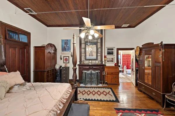 a very nice looking room with a large mirror and a chandelier