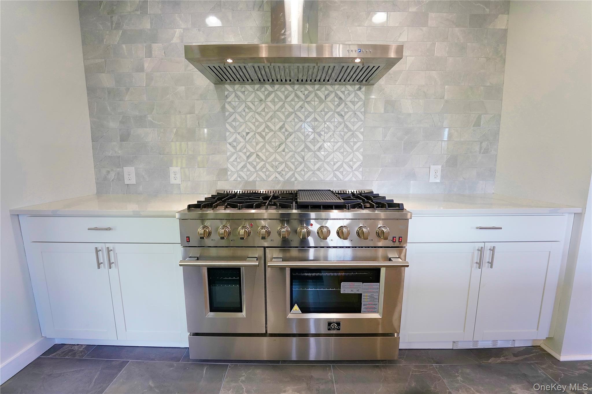 70 Royce Road Bethel, NY 12786 - Photo 17 of 48 a stove top oven sitting inside of a kitchen