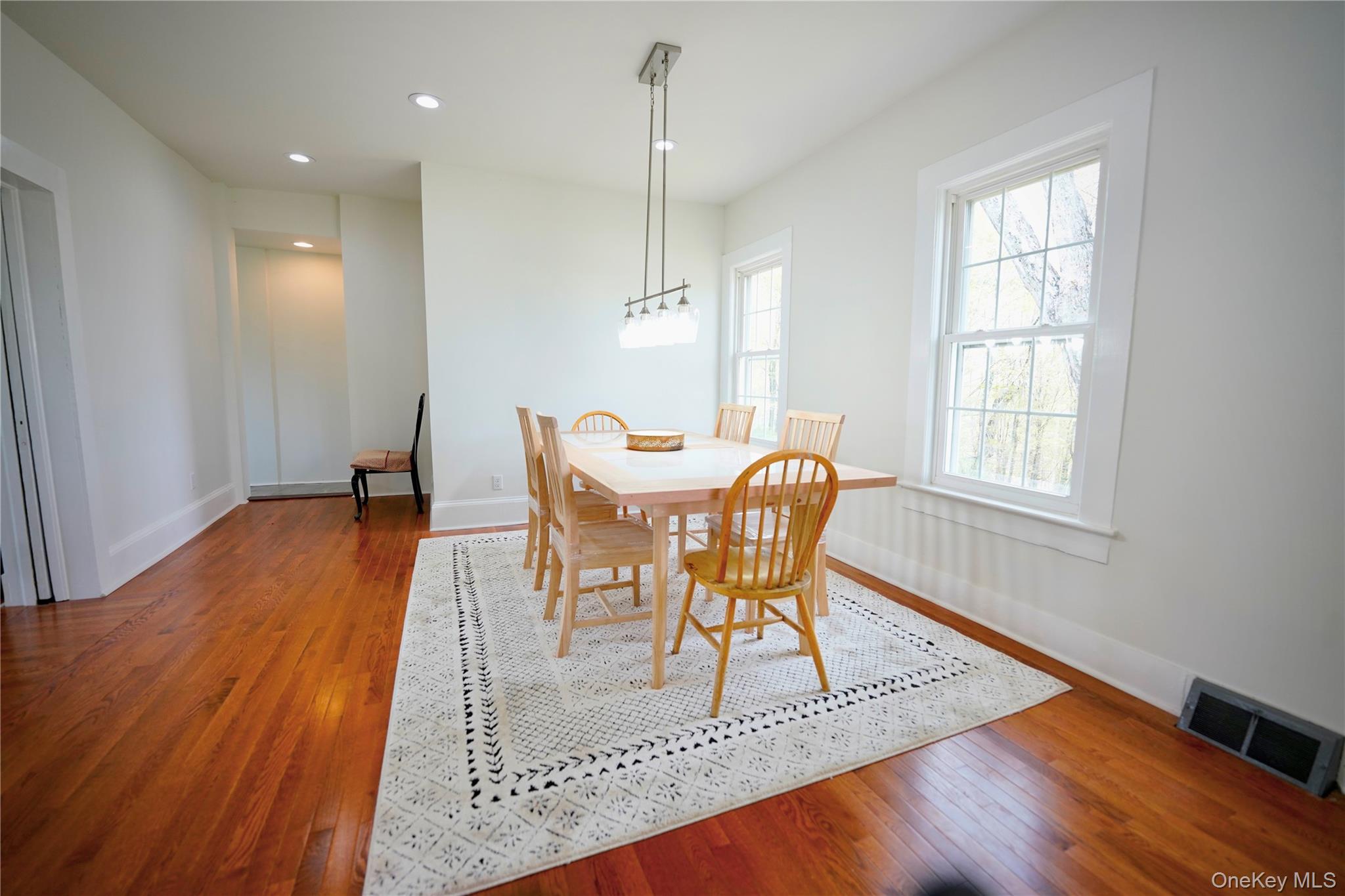 70 Royce Road Bethel, NY 12786 - Photo 21 of 48 a view of a dining room with furniture and wooden floor