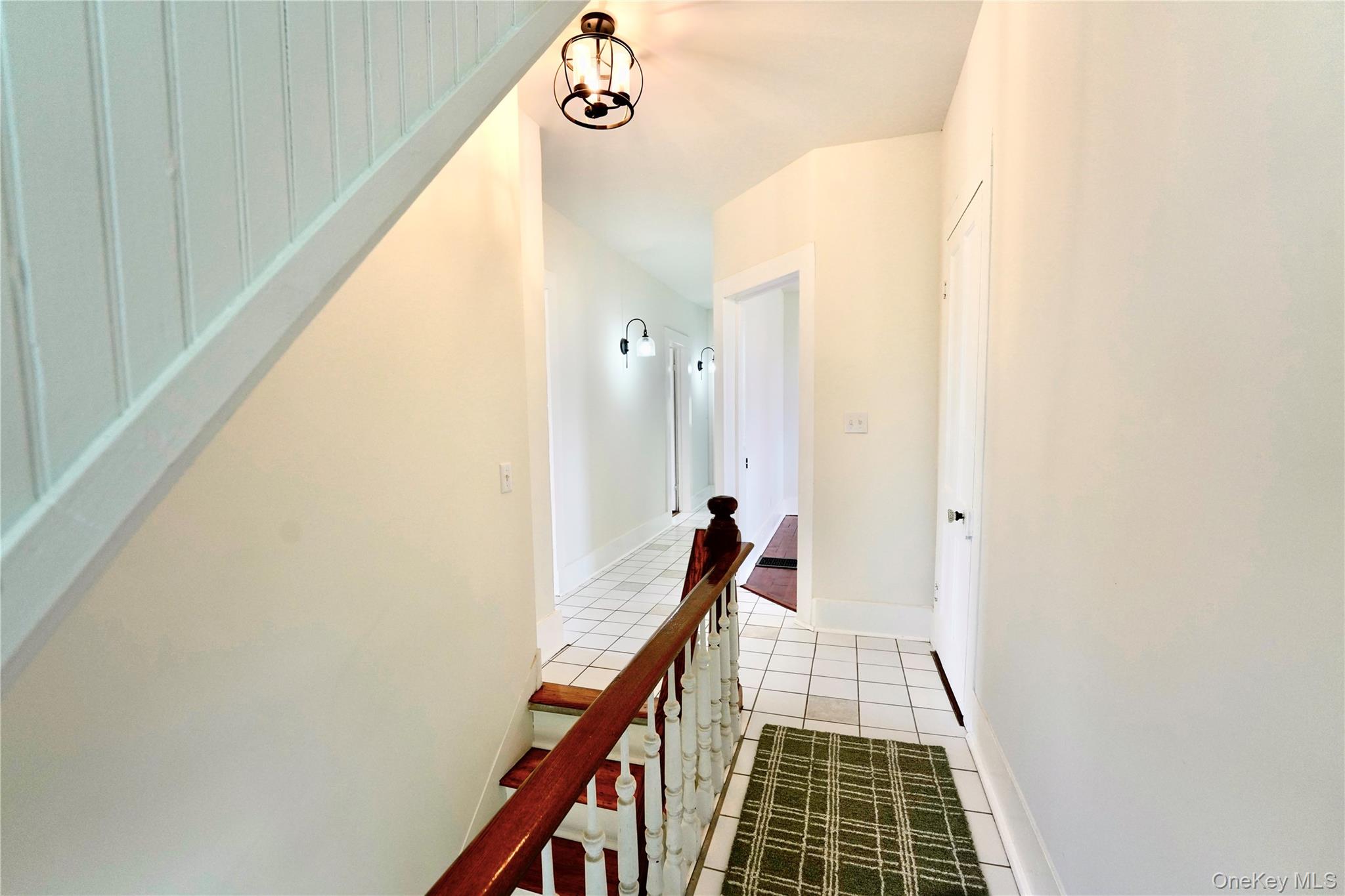 70 Royce Road Bethel, NY 12786 - Photo 26 of 48 a view of a hallway with wooden floor and staircase