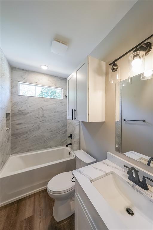 1360 Dickens Road Northwest Lilburn, GA 30047 - Photo 40 of 45 a bathroom with a sink toilet and shower