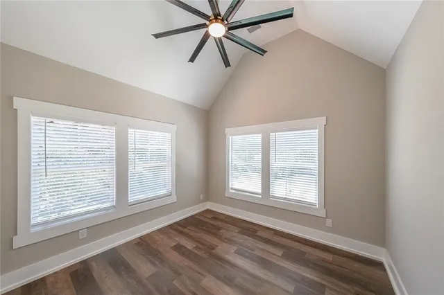 a view of hallway with wooden floor