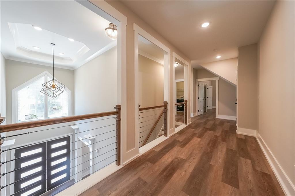 1360 Dickens Road Northwest Lilburn, GA 30047 - Photo 42 of 45 a view of hallway with wooden floor