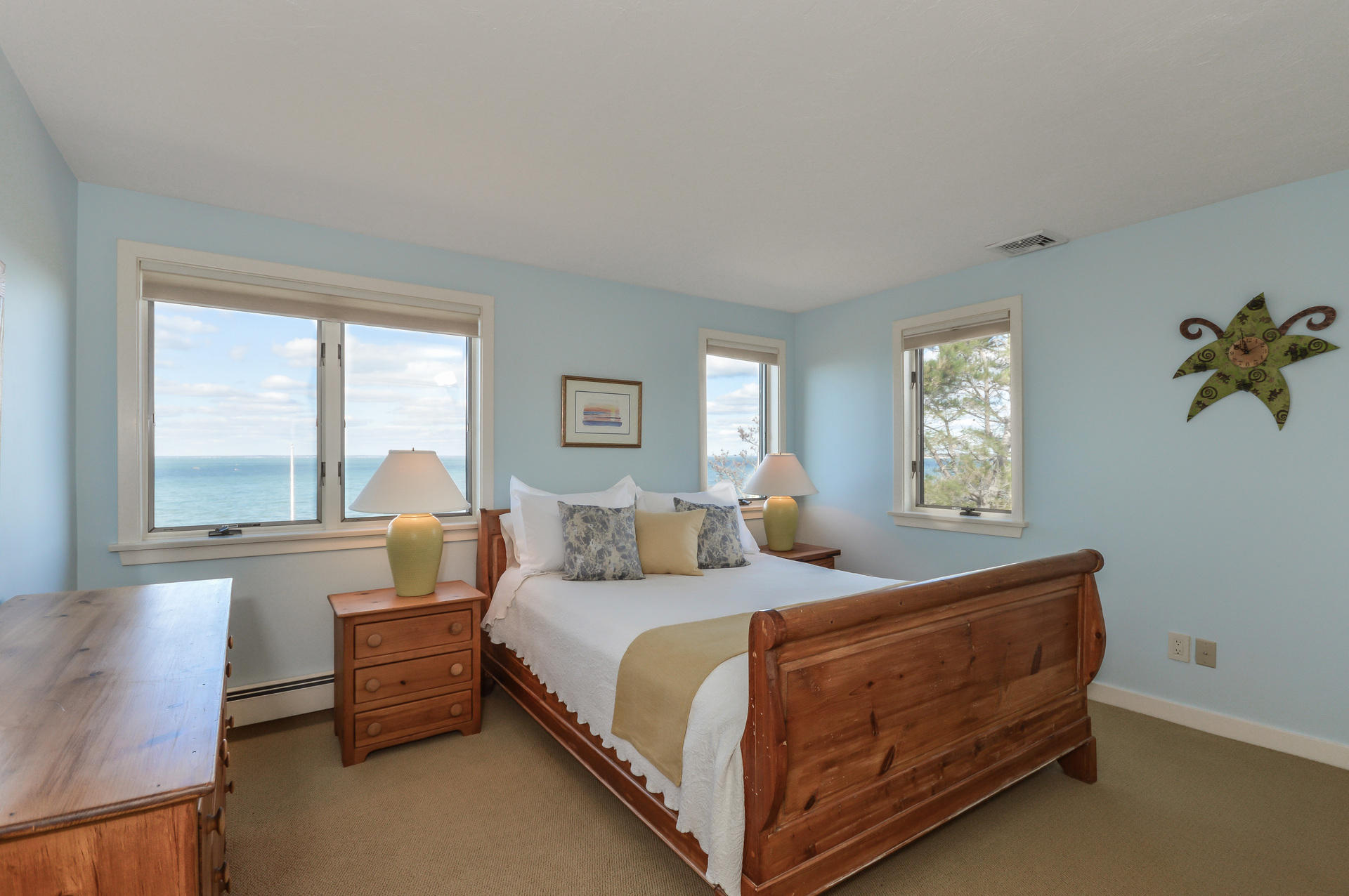 47 Gunning Point Road Falmouth, MA 02540 - Photo 20 of 33 a bedroom with a bed and a large window