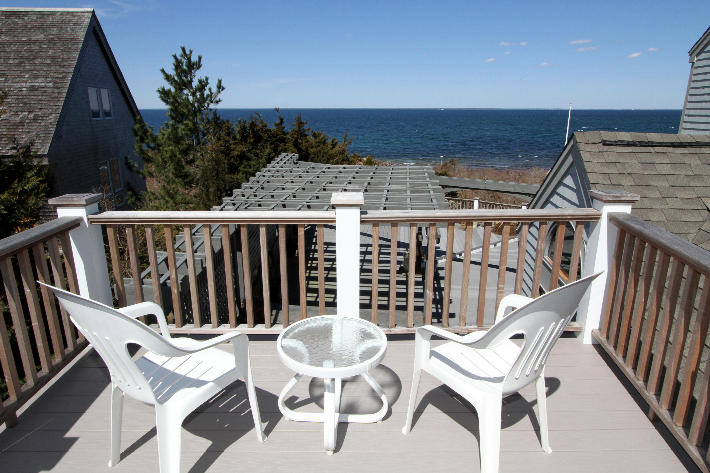 47 Gunning Point Road Falmouth, MA 02540 - Photo 24 of 33 a view of a chairs and table on the terrace