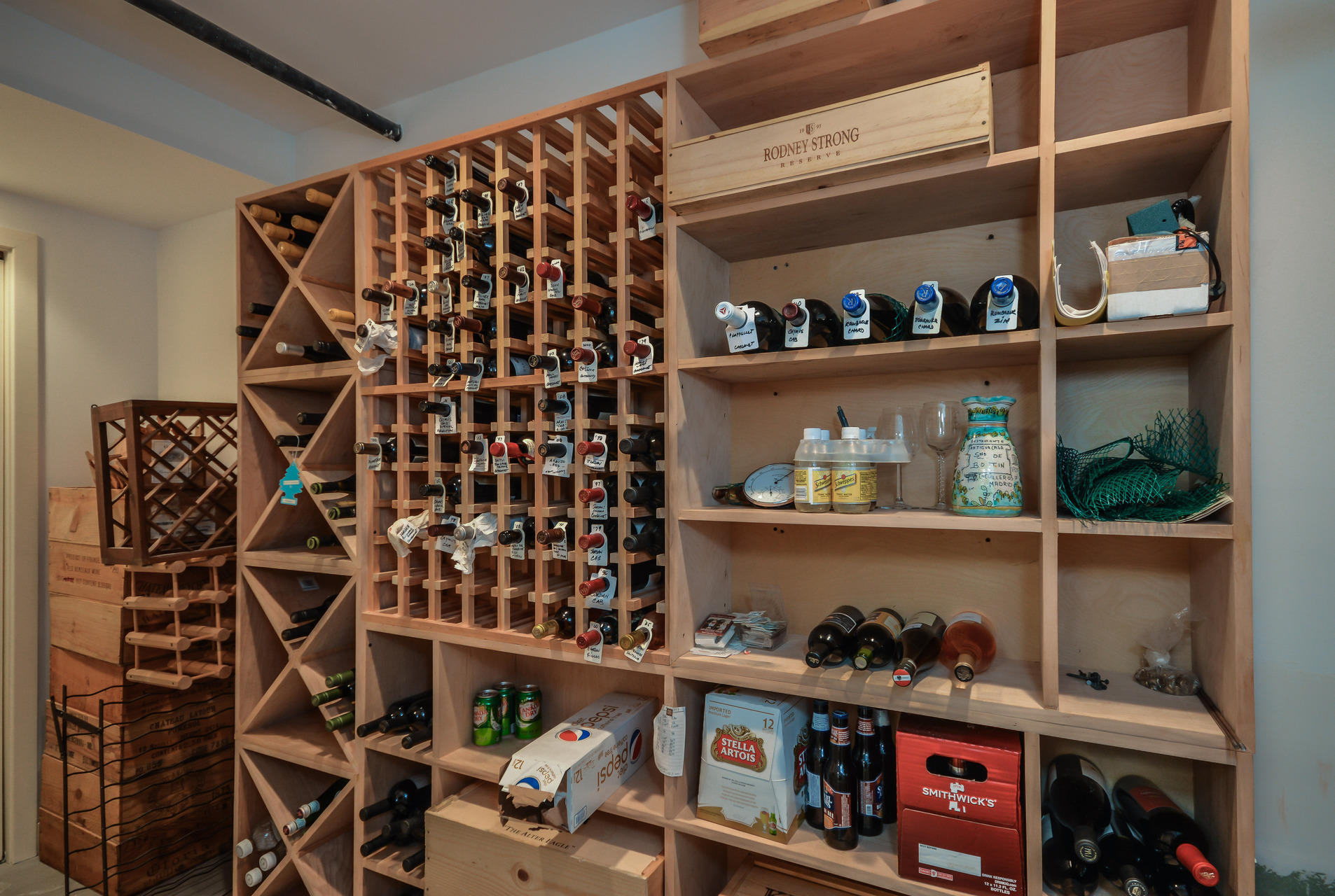 47 Gunning Point Road Falmouth, MA 02540 - Photo 29 of 33 a store room with lots of different colored cloths