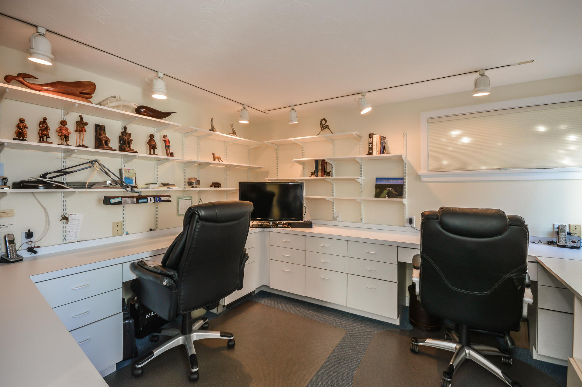 47 Gunning Point Road Falmouth, MA 02540 - Photo 30 of 33 a view of a workspace with furniture and a kitchen