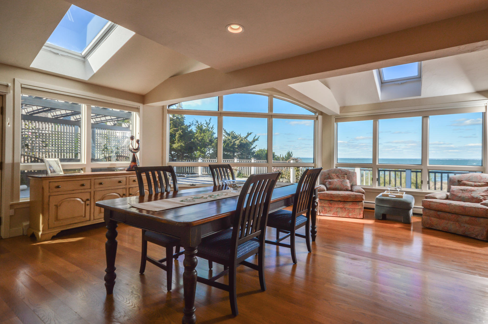 47 Gunning Point Road Falmouth, MA 02540 - Photo 5 of 33 a dining room with furniture window and wooden floor
