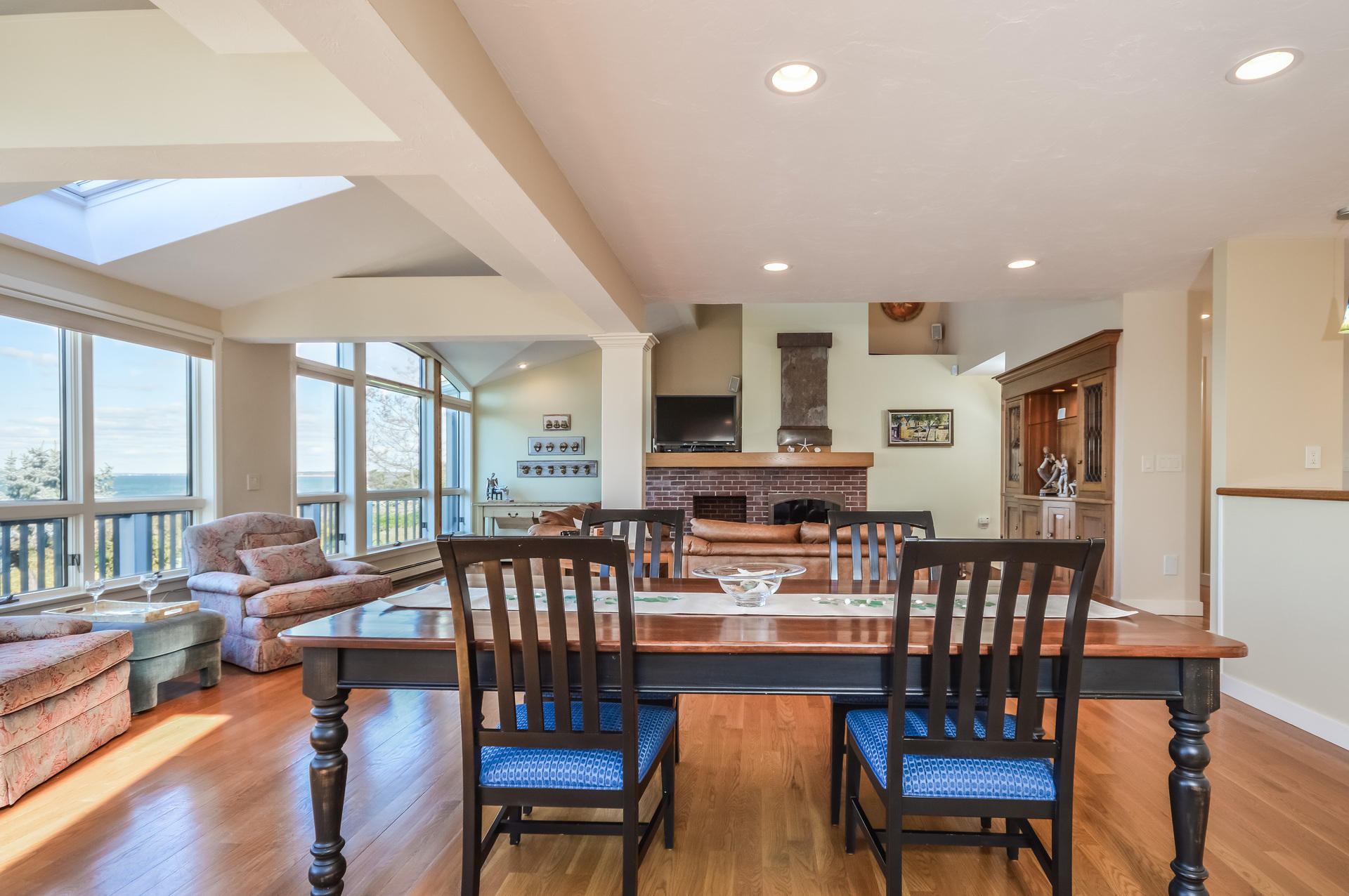 47 Gunning Point Road Falmouth, MA 02540 - Photo 6 of 33 a view of a dining room with furniture window and wooden floor
