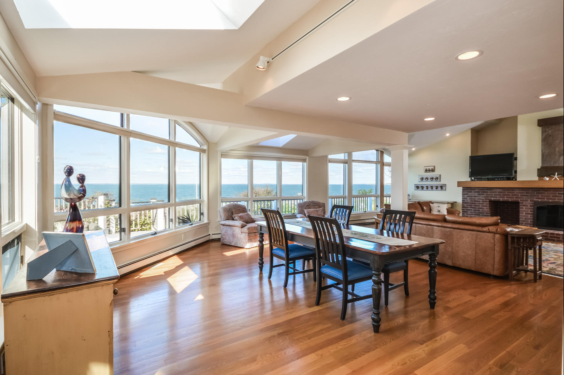 47 Gunning Point Road Falmouth, MA 02540 - Photo 7 of 33 a view of a dining room with furniture window and wooden floor