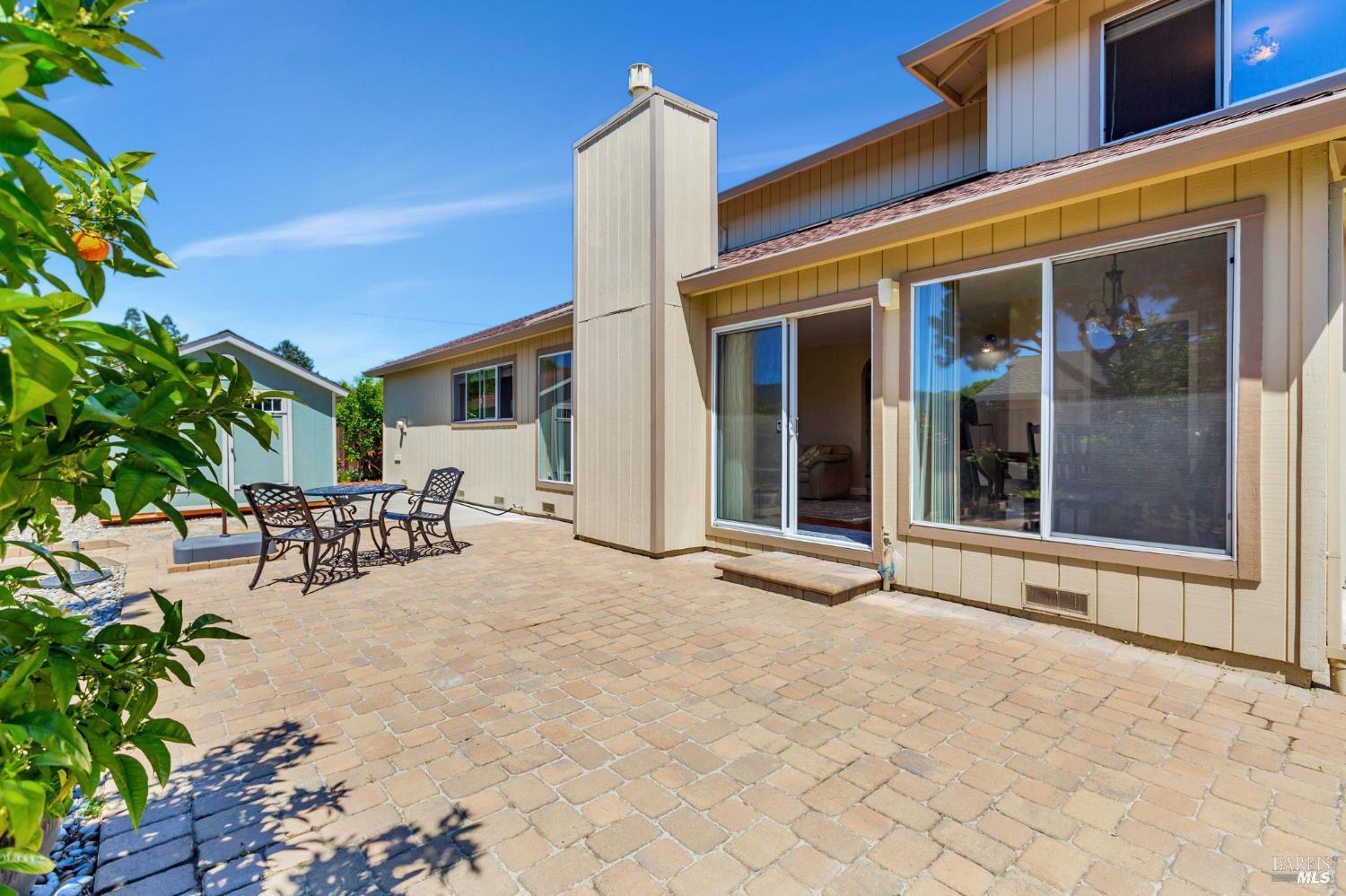 99 San Benito Way Novato, CA 94945 - Photo 21 of 30 a view of house with outdoor seating space