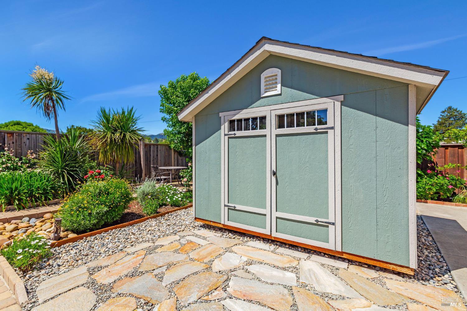 99 San Benito Way Novato, CA 94945 - Photo 24 of 30 a front view of a house with a yard