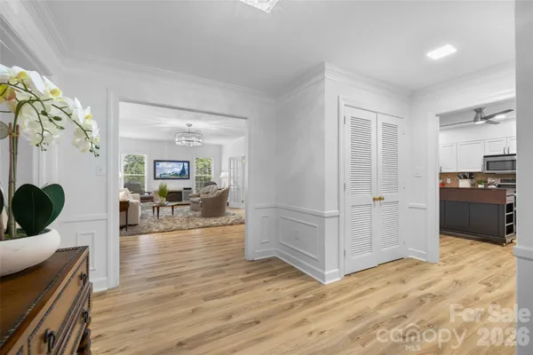 a view of a room with wooden floor and chair