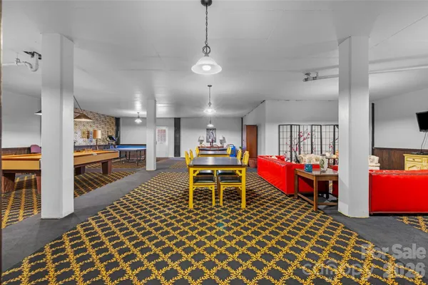 a room with lots of chairs and tables