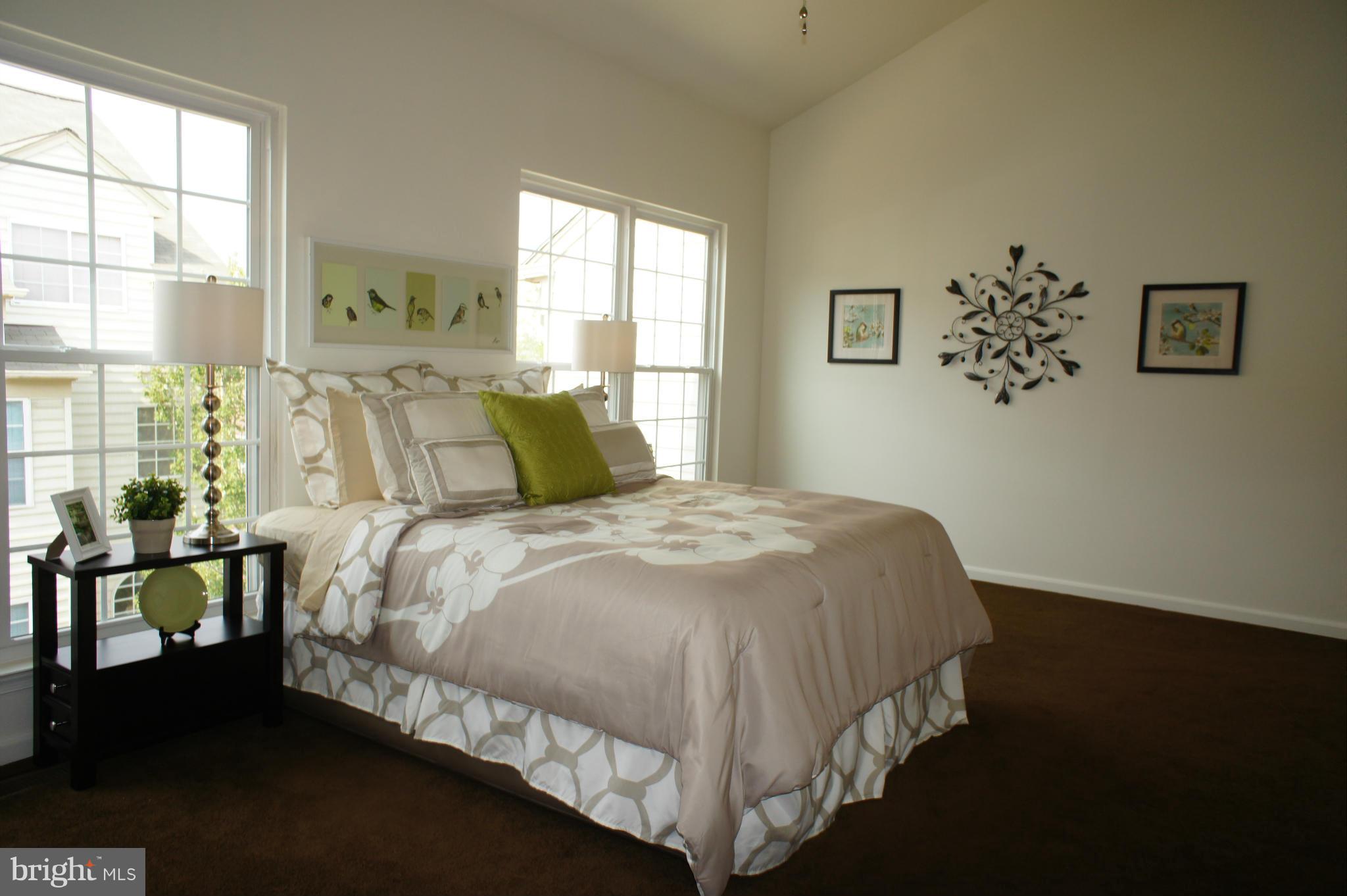 6021 Riddle Walk Alexandria, VA 22312 - Photo 15 of 30 a bedroom with a bed and window