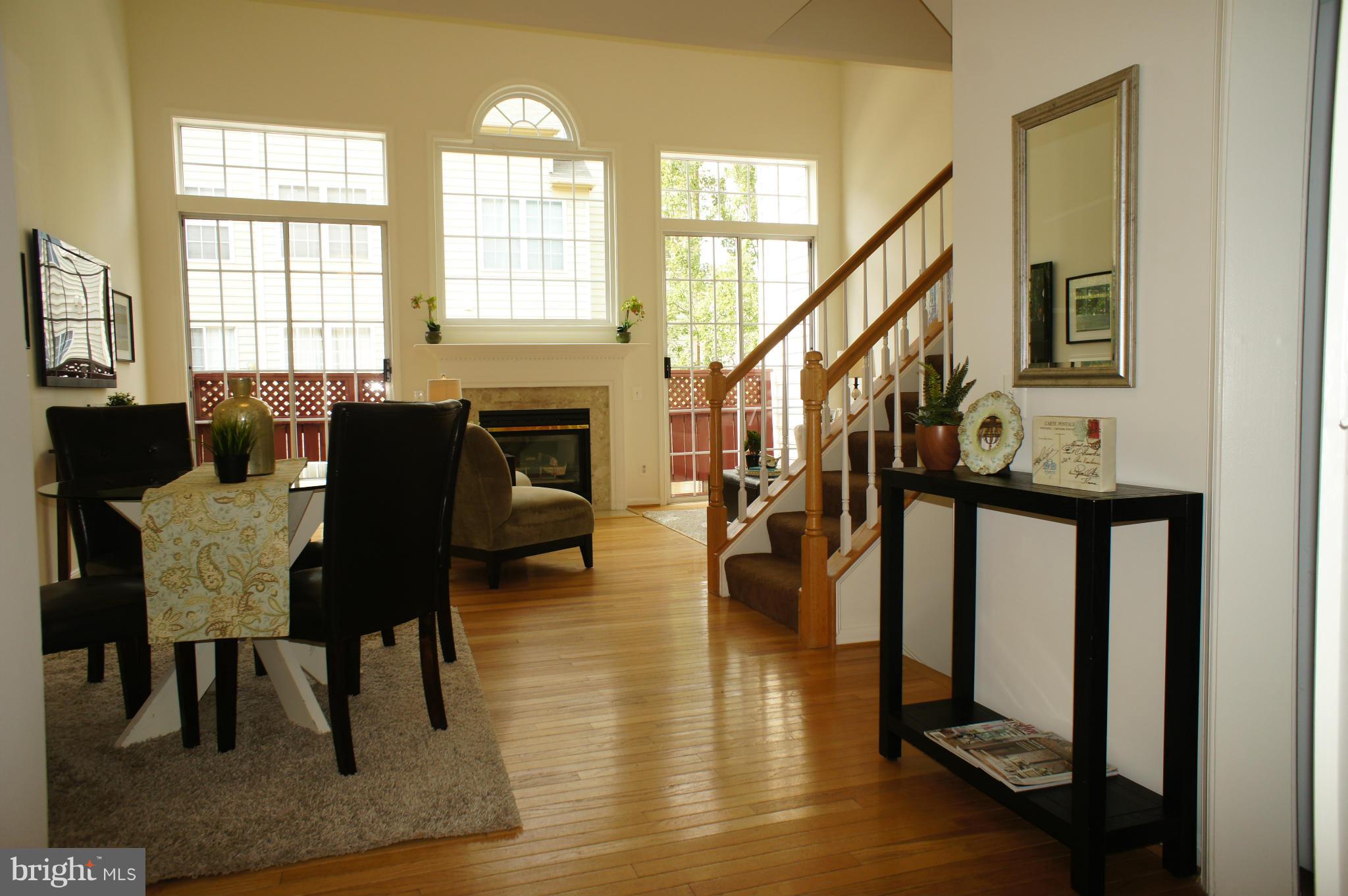 6021 Riddle Walk Alexandria, VA 22312 - Photo 3 of 30 a living room with furniture and a window