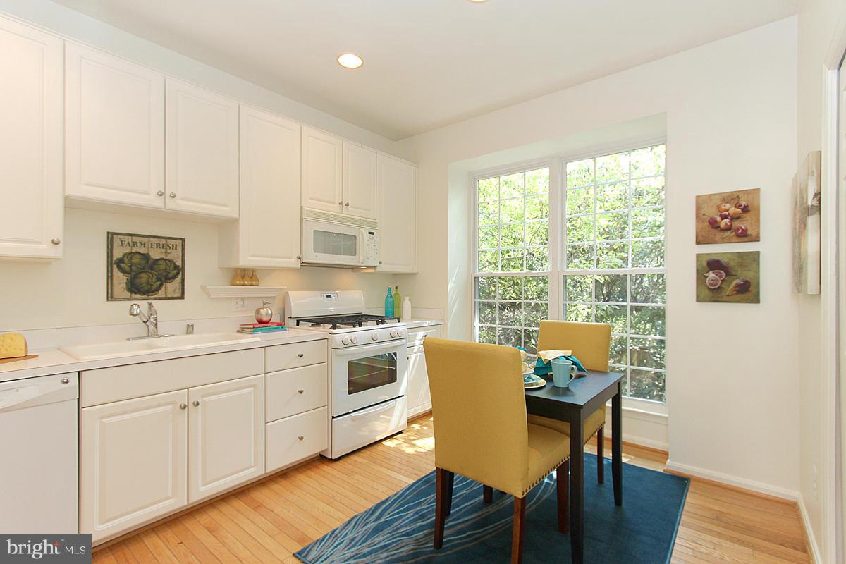 6021 Riddle Walk Alexandria, VA 22312 - Photo 4 of 30 a view of a dining room with furniture window and wooden floor