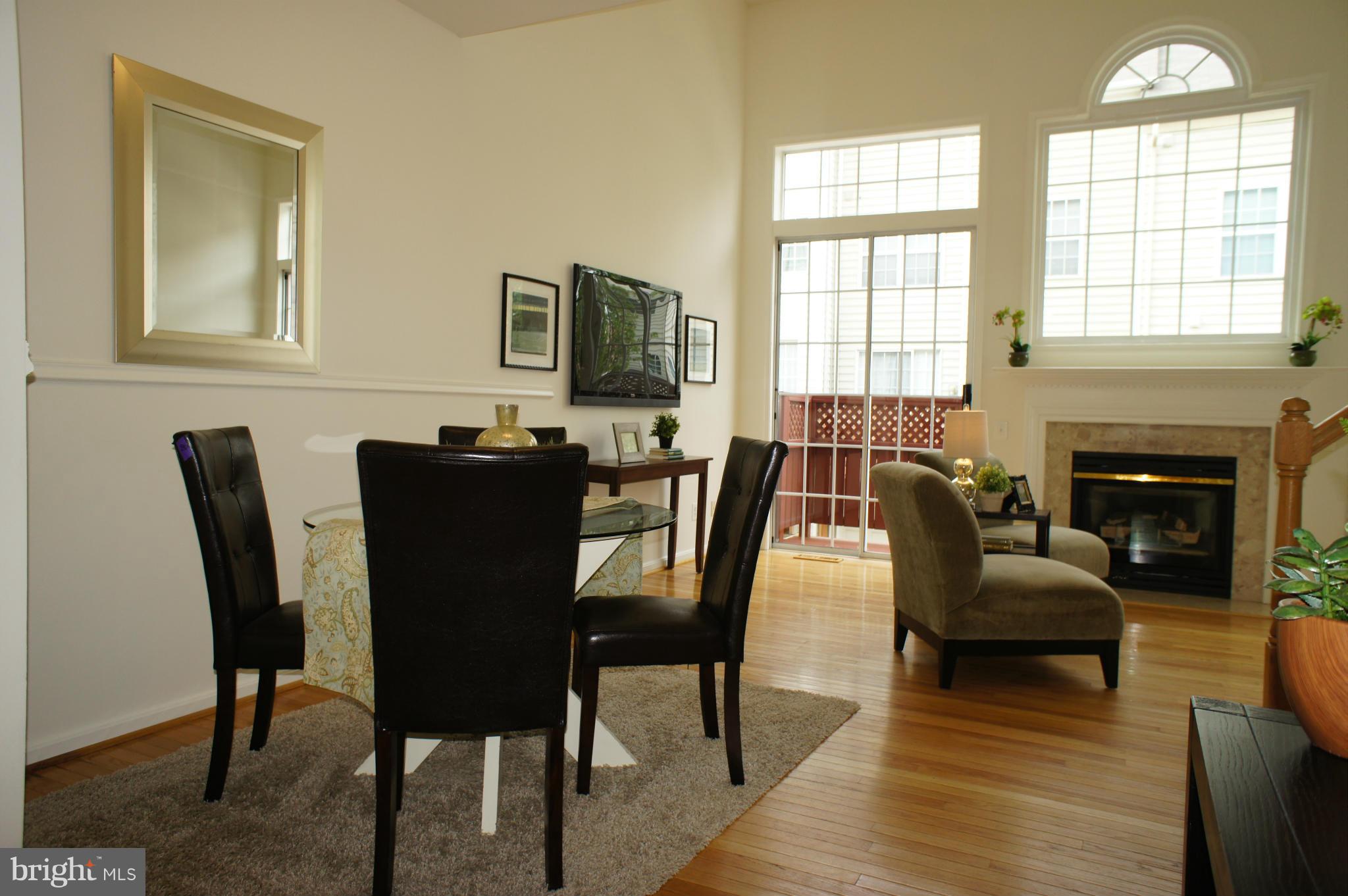 6021 Riddle Walk Alexandria, VA 22312 - Photo 8 of 30 a view of a dining room with furniture and chandelier