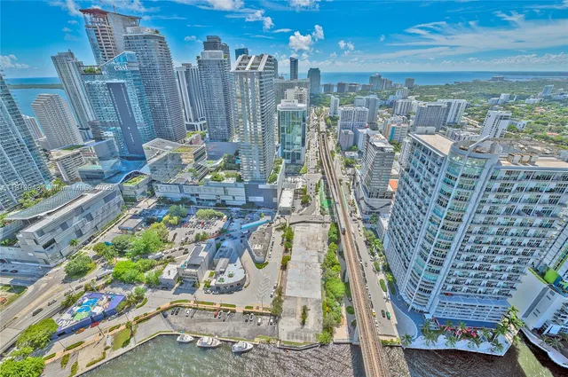 a view of a building with a yard