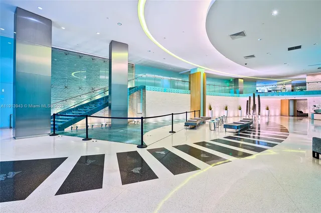 a swimming pool with outdoor seating and yard