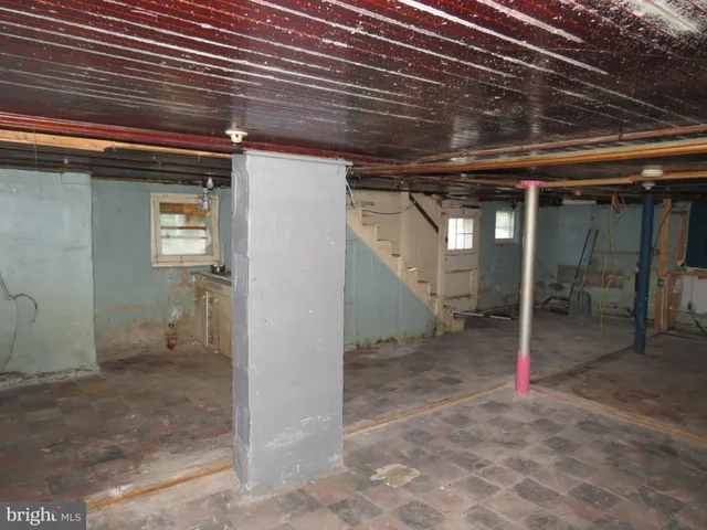 a view of a room with wooden wall