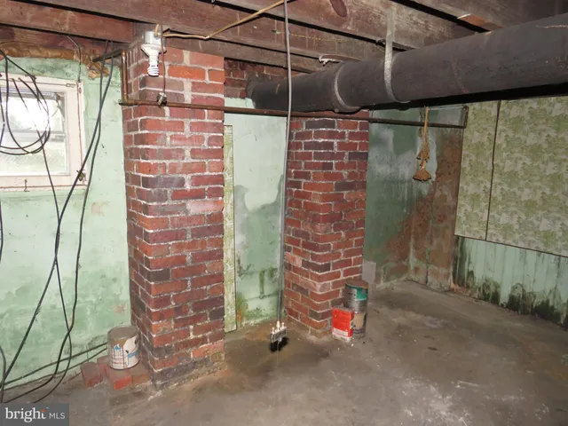 a bathroom with a shower and a sink