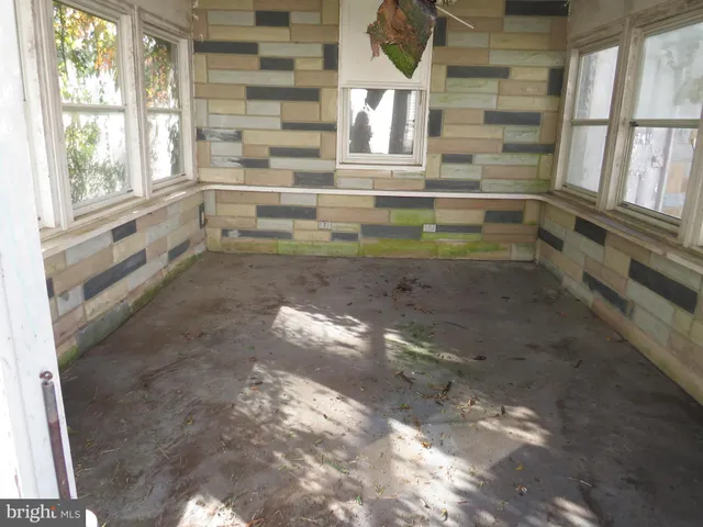 a view of a back yard of the house