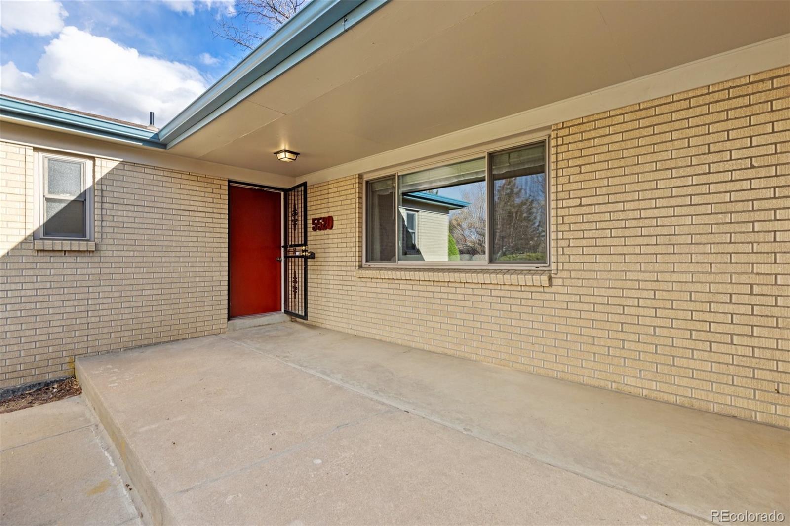 5520 East Bails Drive Denver, CO 80222 - Photo 2 of 38 a view of an empty room with a window