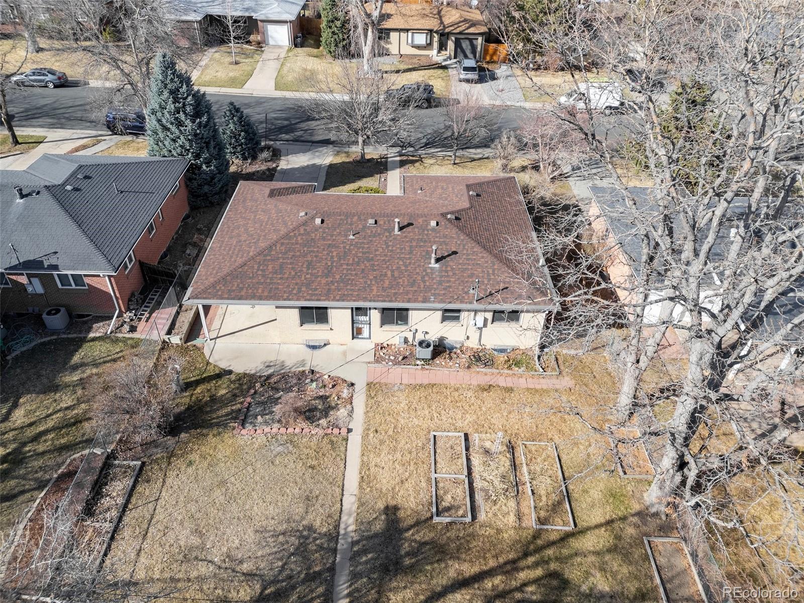 5520 East Bails Drive Denver, CO 80222 - Photo 26 of 38 an aerial view of residential houses with outdoor space