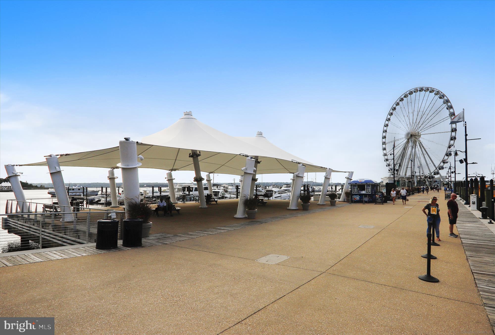 4007 1st Street Southwest Washington, DC 20032 - Photo 24 of 48 a group of chairs and a table under an umbrella