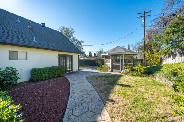 an aerial view of a houses with outdoor space