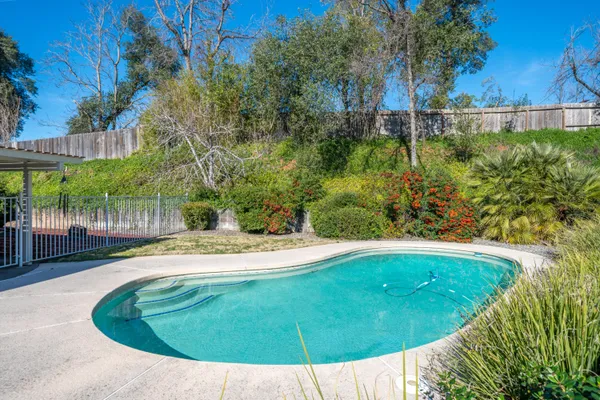 a view of outdoor space yard and swimming pool