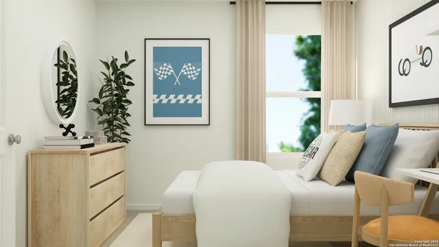 a bedroom with furniture and a window