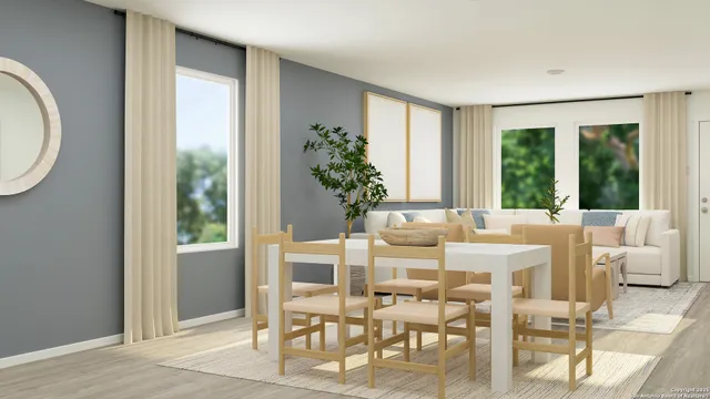 a dining room with furniture window and outside view