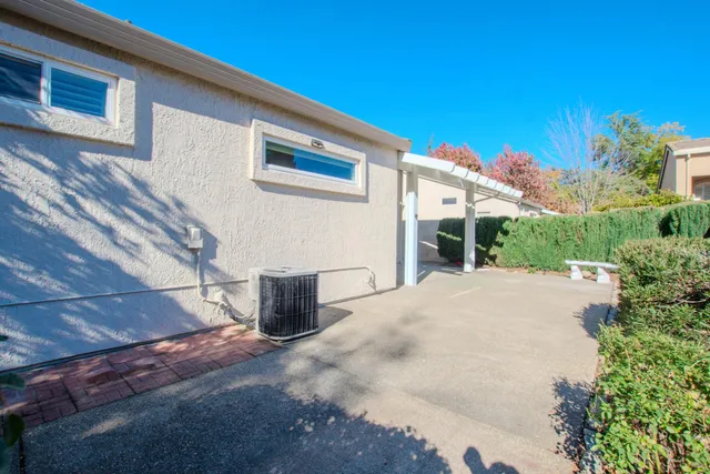 a front view of a house with a garage