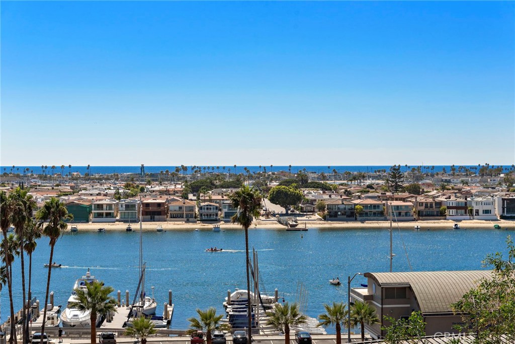 1701 Kings Road Newport Beach, CA 92663 - Photo 1 of 1 a view of a lake with a city view