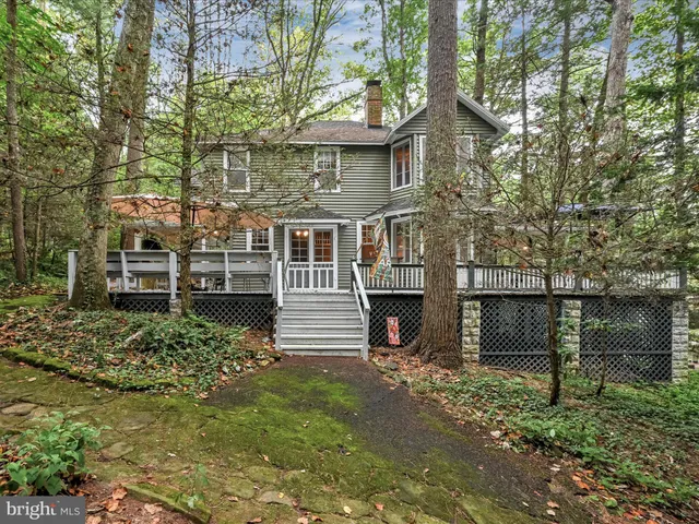 a view of house with outdoor space