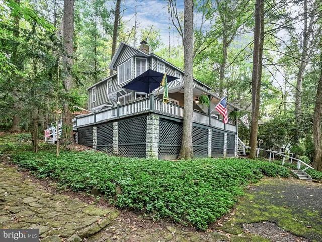 a view of a house with a street