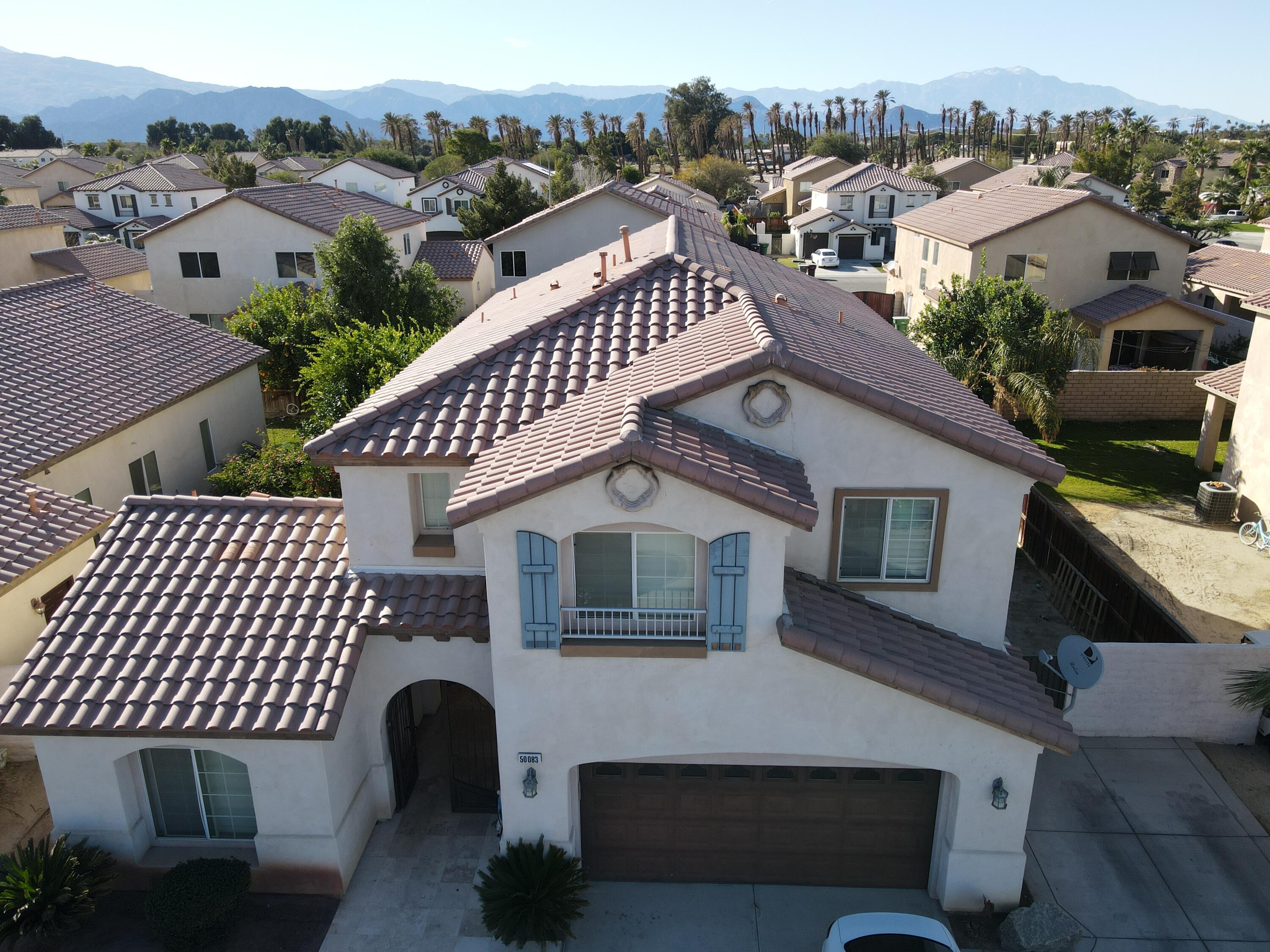 50083 San Solano Road Coachella, CA 92236 - Photo 2 of 6 a front view of a house with a yard