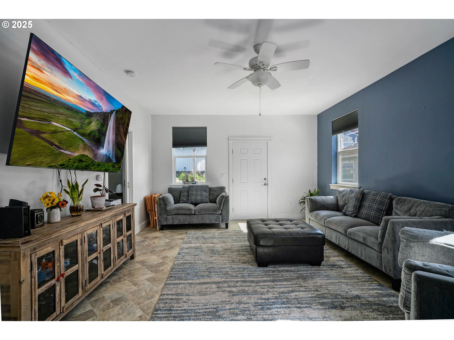 466 Northwest Denton Avenue Dallas, OR 97338 - Photo 13 of 43 a living room with furniture and a flat screen tv