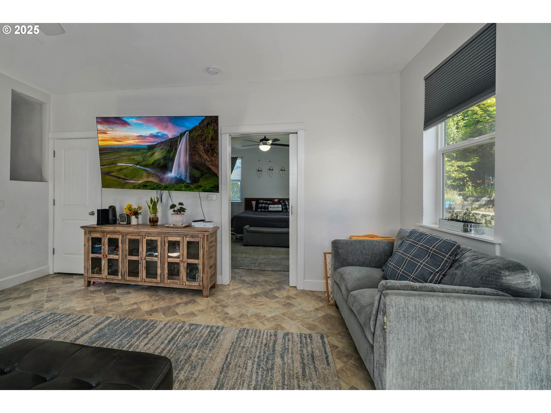 466 Northwest Denton Avenue Dallas, OR 97338 - Photo 15 of 43 a living room with furniture and a flat screen tv