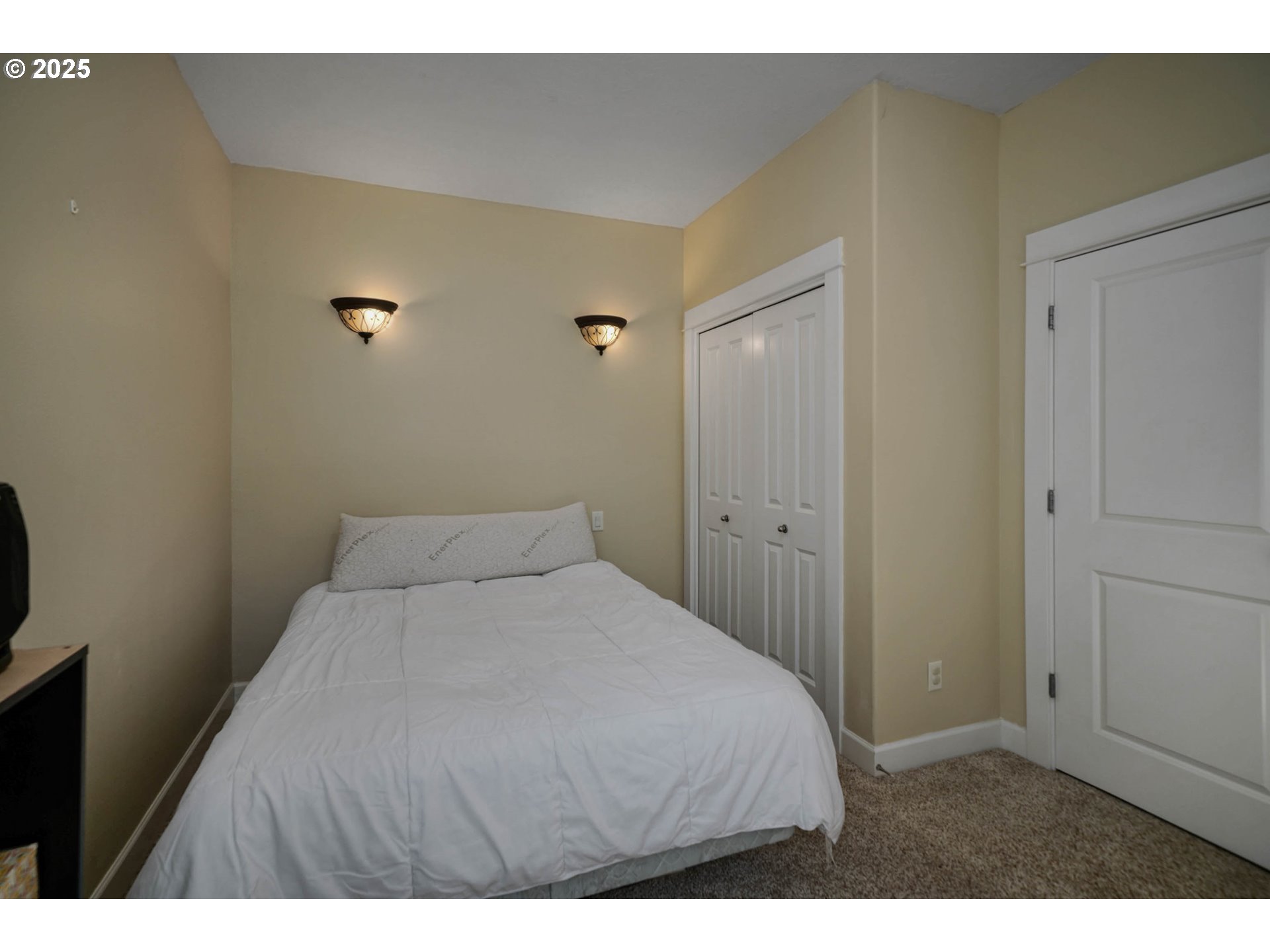 466 Northwest Denton Avenue Dallas, OR 97338 - Photo 20 of 43 a bedroom with a bed and a night stand
